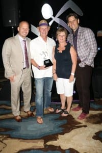 Dean and Becky Carpenter with Dave Mortensen (L) and Chuck Runyon (R). Photo courtesy of Anytime Fitness. 